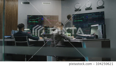 Multi ethnic team analyze exchange market charts Multi ethnic team analyze exchange market charts 104250621