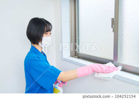 woman cleaning the room woman cleaning the room 104252154