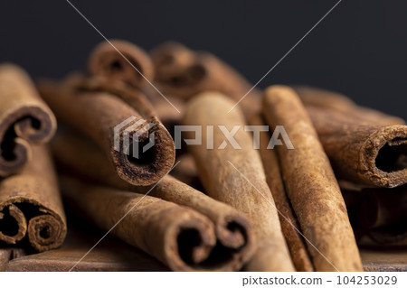Whole dried cinnamon for baking 104253029