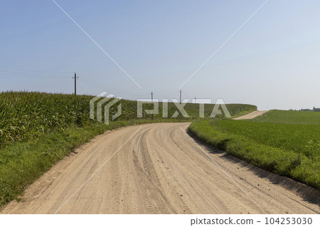 Rural road for cars and transport Rural road for cars and transport 104253030