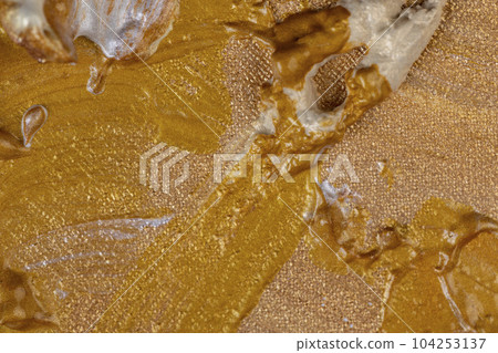 Abstract chaotic painting on canvas with gold paints Abstract chaotic painting on canvas with gold paints 104253137