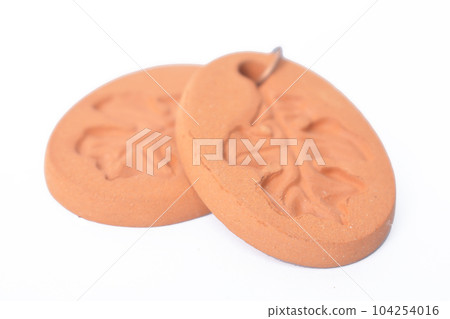 clay earrings on white background isolate 104254016
