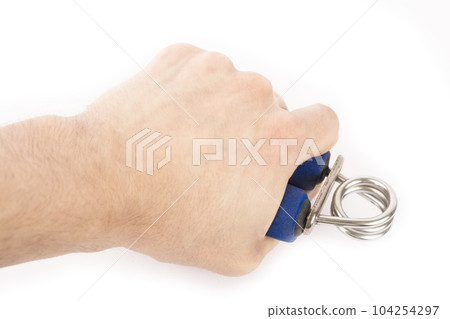Blue rubber expander for sports, on a white background and in a male hand. A hand squeezes an expander. Forearm and grip Blue rubber expander for sports, on a white background and in a male hand. A hand squeezes an expander. Forearm and grip 104254297