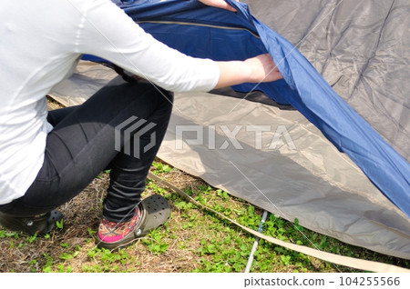 Pitching a tent, setting up image photo|Outdoor camping Pitching a tent, setting up image photo|Outdoor camping 104255566