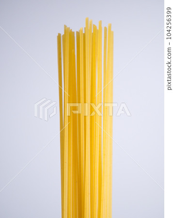 Spaghetti dried noodles before cooking 104256399