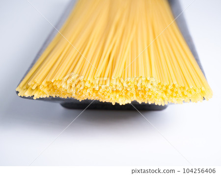 Spaghetti dried noodles before cooking 104256406