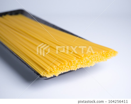 Spaghetti dried noodles before cooking 104256411