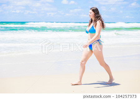 Foreign women in swimsuits walking on the beach - Stock Photo [104257373] -  PIXTA