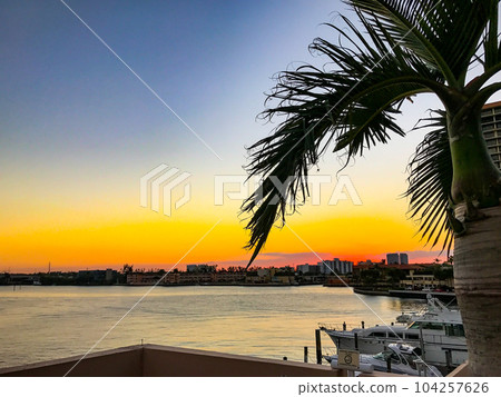 Sunset view of a canal and yachts in Hallandale beach, Florida. High quality photo Sunset view of a canal and yachts in Hallandale beach, Florida. High quality photo 104257626