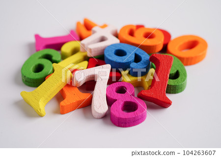Number wood block cubes for learning Mathematic, education math concept. 104263607