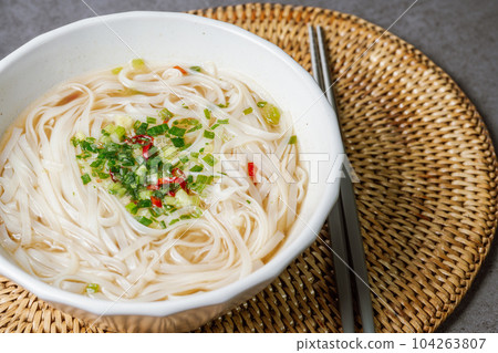 Vietnamese food rice noodle dish in a white bowl 104263807