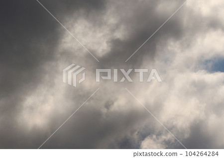 Stormy weather and dark clouds. 104264284