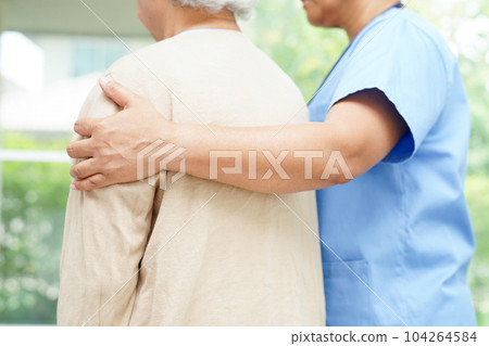 Doctor examine and treat asian elderly patient muscle back pain problem and physical therapy in hospital. Doctor examine and treat asian elderly patient muscle back pain problem and physical therapy in hospital. 104264584