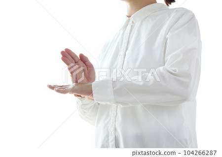 A woman communicating in sign language A woman communicating in sign language 104266287