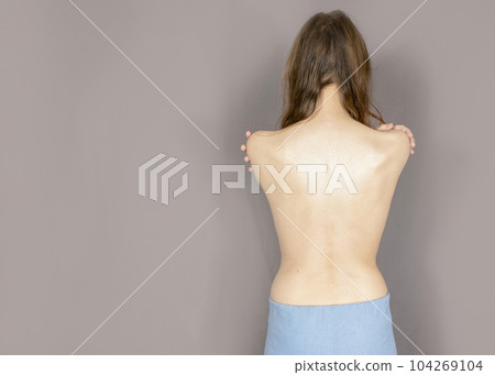 The beautiful woman's body on gray background 104269104