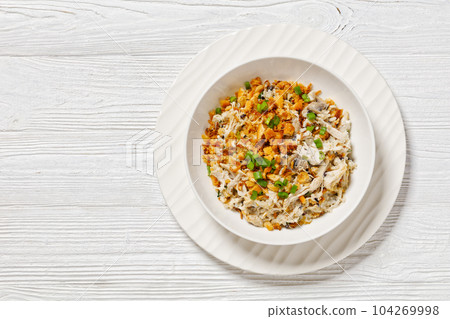 Chicken Rice Casserole in white bowl, top view Chicken Rice Casserole in white bowl, top view 104269998