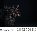 Dead Bouquet of Flowers against Black Background 104270838