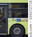 Close up of public bus driving on Singapore Road 104272718