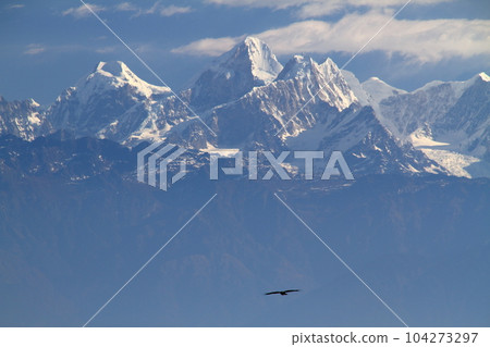 View of the Himalayas from the view tower observatory in Nagarkot, a village on the outskirts of Kathmandu, Nepal in South Asia View of the Himalayas from the view tower observatory in Nagarkot, a village on the outskirts of Kathmandu, Nepal in South Asia 104273297