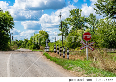 Photography to theme railway track after passing train on railroad Photography to theme railway track after passing train on railroad 104273366