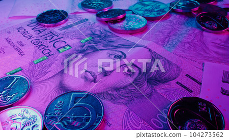 Czech crowns cash money macro background. Ceska koruna. Banknotes and coins,neon 104273562