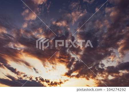 Amazing cloudscape on the sky at sunset. 104274292