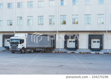 Freight truck stands by the storage. Freight truck stands by the storage. 104274296