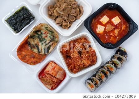 Korean takeout gimbap kimchi yangnyeom chicken pancake bulgogi sundubu jjigae 104275009