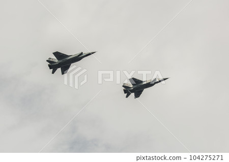 two airplanes mig 31 flying against the sky two airplanes mig 31 flying against the sky 104275271