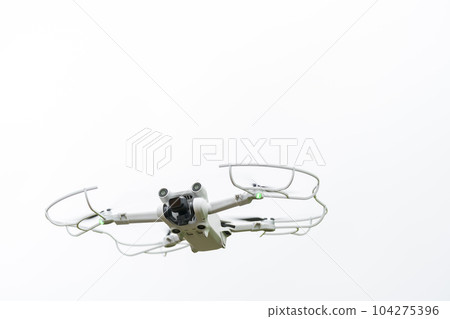 Drone aircraft in flight White background Drone aircraft in flight White background 104275396