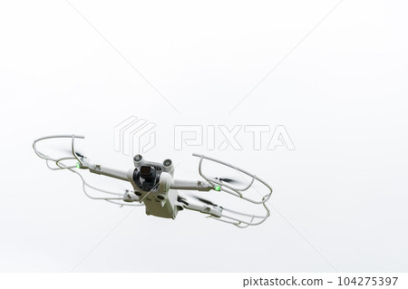Drone aircraft in flight White background 104275397