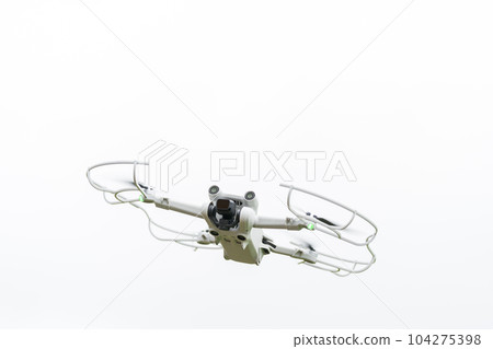 Drone aircraft in flight White background 104275398