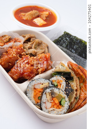 Korean bento box take-out gimbap kimchi yangnyeom chicken pancake bulgogi sundubu jjigae 104275401