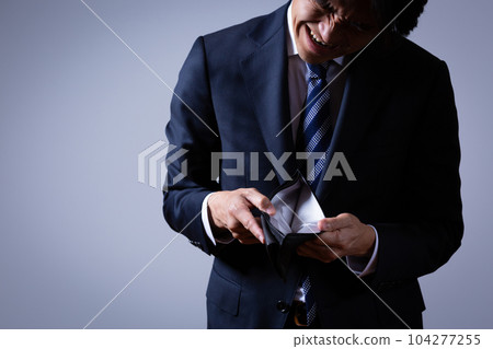 Male businessman suffering from lack of money 104277255