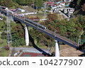 A train running on the Yunishigawa Bridge on the Aizu Kinugawa Line during the fall foliage season 104277907