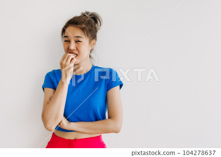 Woman in colorful clothes feeling hesitate isolated on white. Woman in colorful clothes feeling hesitate isolated on white. 104278637