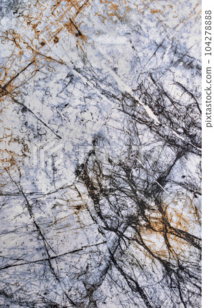 An abstract pattern on white with blue marble, streaked with black cracks and veins. 104278888