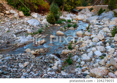 Ancient stone bridge across a mountain river in Kesme Bogaz canyon, Antalya province in Turkey 104279055
