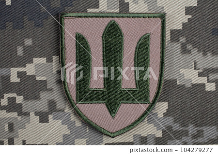 KYIV, UKRAINE - October 5, 2022. Russian invasion in Ukraine 2022. Ukraine Army uniform shoulder sleeve insignia badge. 104279277