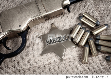 Old west marshal badge with ammunition Old west marshal badge with ammunition 104279303