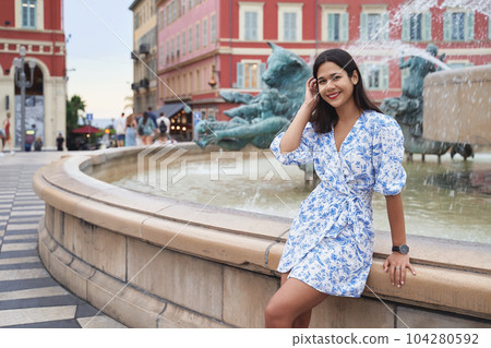 Beautiful young mixed race woman at Place Massena in Nice, France 104280592