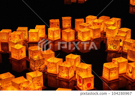 Background asset glowing golden lanterns on black pond 104280967