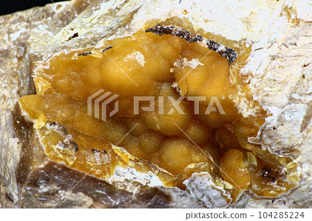 Nodular sintered chalcedony of deep yellow color in flint rock Nodular sintered chalcedony of deep yellow color in flint rock 104285224