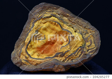 A fragment of a limonite nodule (brown iron ore) A fragment of a limonite nodule (brown iron ore) 104285277