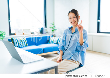 a woman working from home a woman working from home 104285559