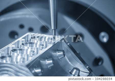 Close up scene the 5-axis machining center cutting the V8 engine cylinder block with solid ball end mill tool. 104286034