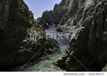 Kitayamazaki with beautiful cliffs and blue sea Kitayamazaki with beautiful cliffs and blue sea 104288317