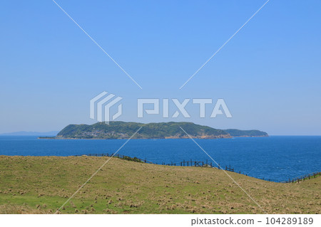 View of Kakara Island across the Sea of Genkai from Kabe Island 104289189