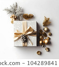 An arrangement of of gold and silver Christmas decorations Gift box on white background. Flat lay. Copy space. with generative Ai. 104289841