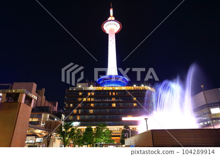 [Kyoto Prefecture] Night view of Kyoto Tower and fountain (JR Kyoto Station) 104289914